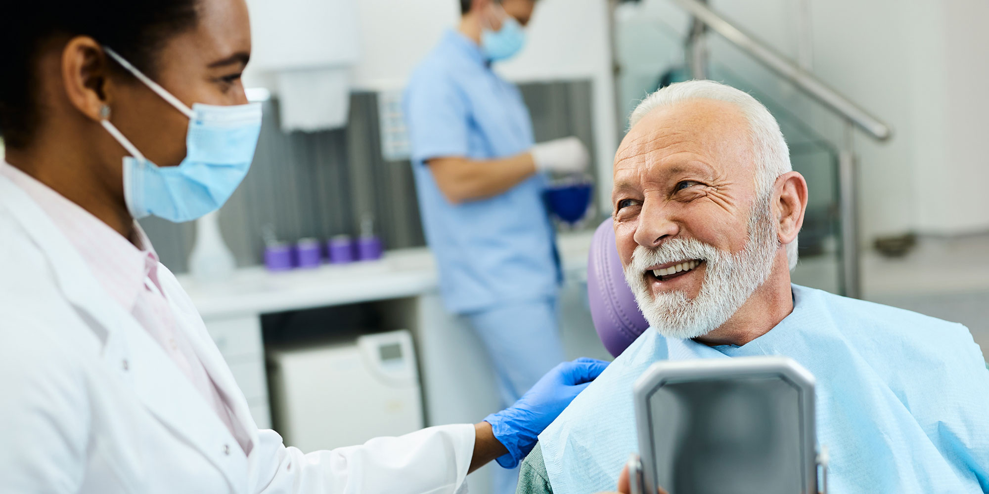 patient with mirror happy with implant results2