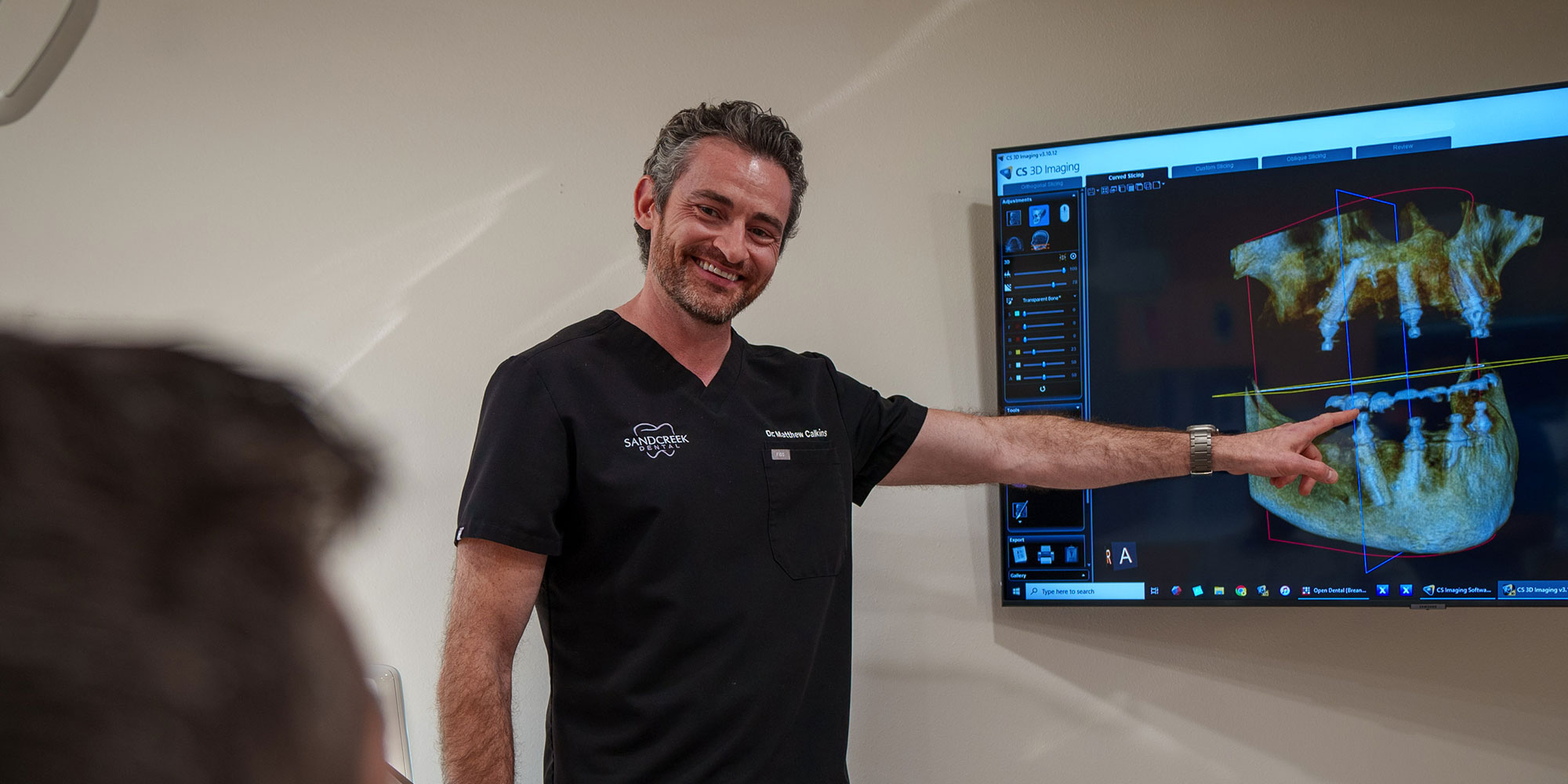 dr with dental patient at sand creek