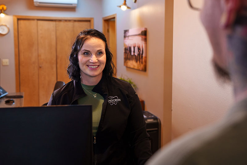 insurance coordinator with patient