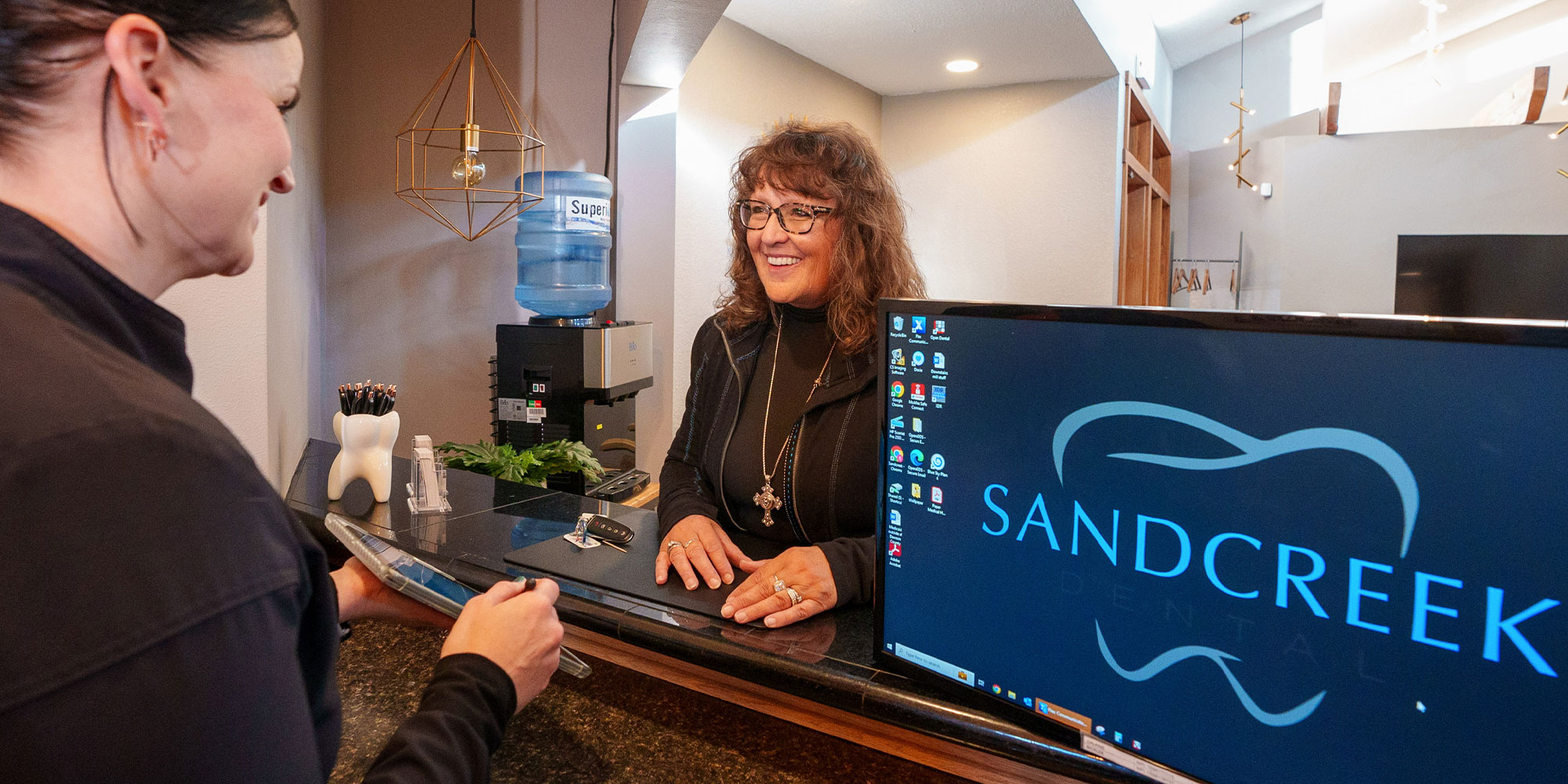 sand creek insurance coordinator with patient